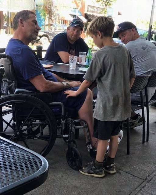A Boy Approached My Wheelchair in a Packed Café and Said He Could Make Me Walk — I Laughed, Until My Toes Moved After Twenty Silent Years