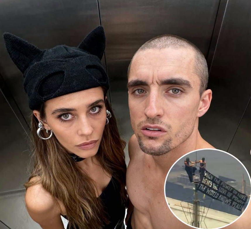 Couple scales Empire State Building – people question true intentions